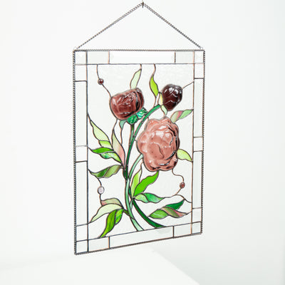 Window panel of stained glass depicting peonies
