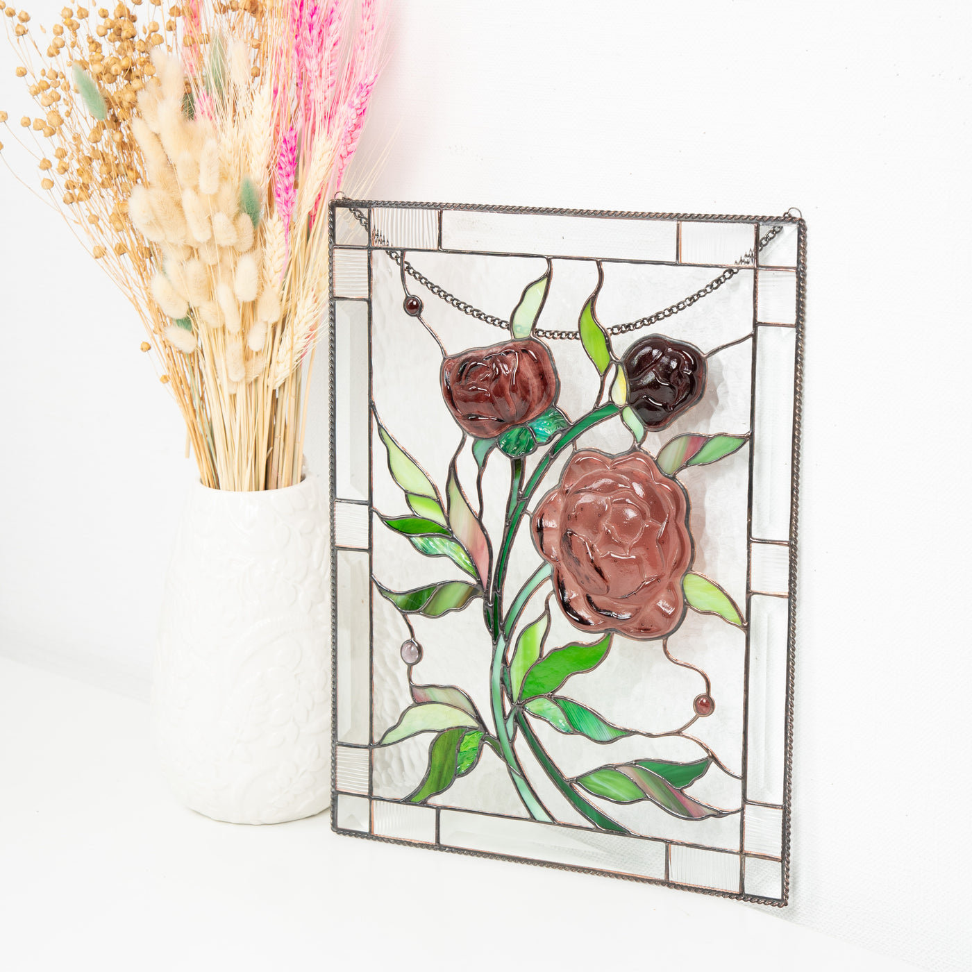 Window hanging of fused stained glass depicting peonies