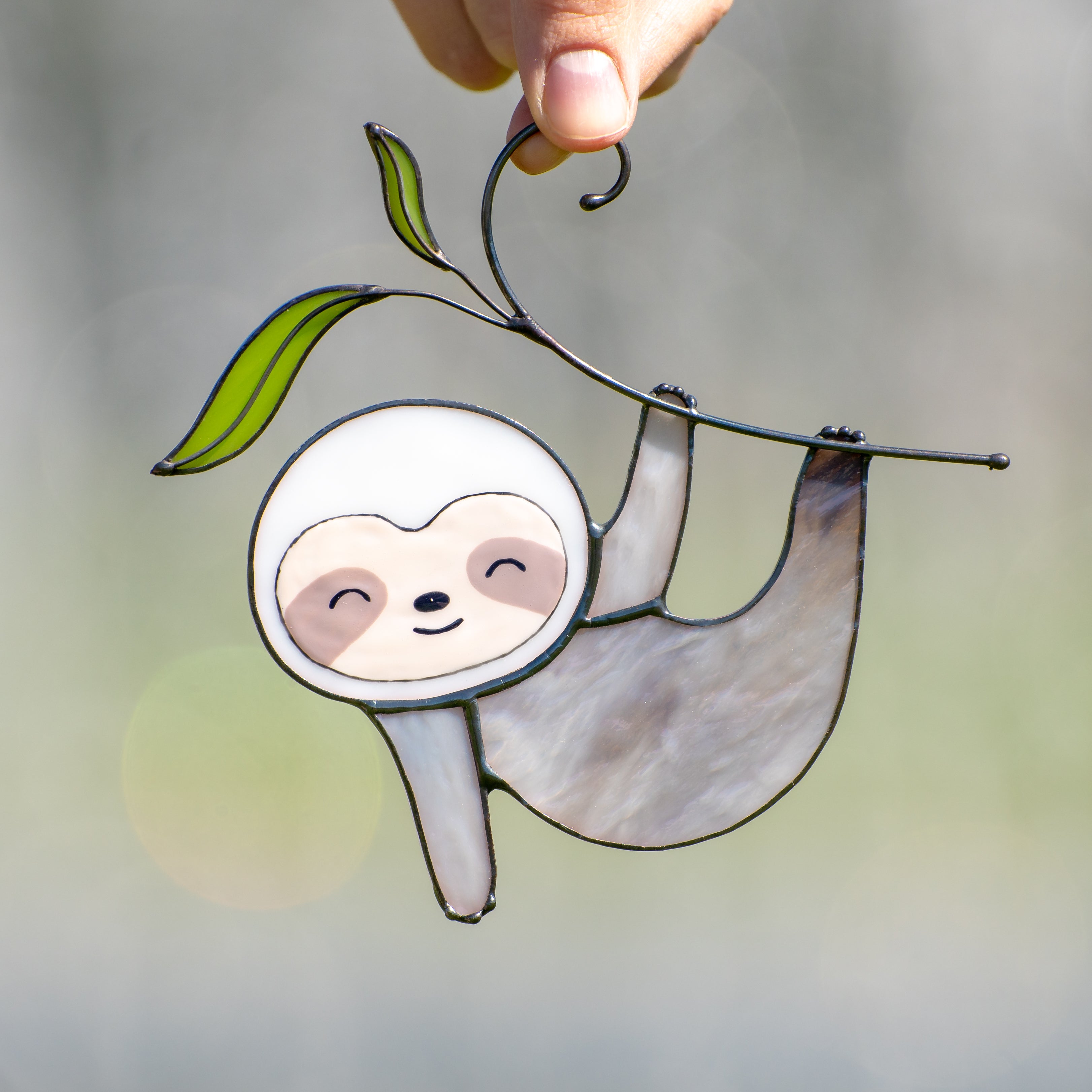 Sloth on the branch with leaves window hanging of stained glass
