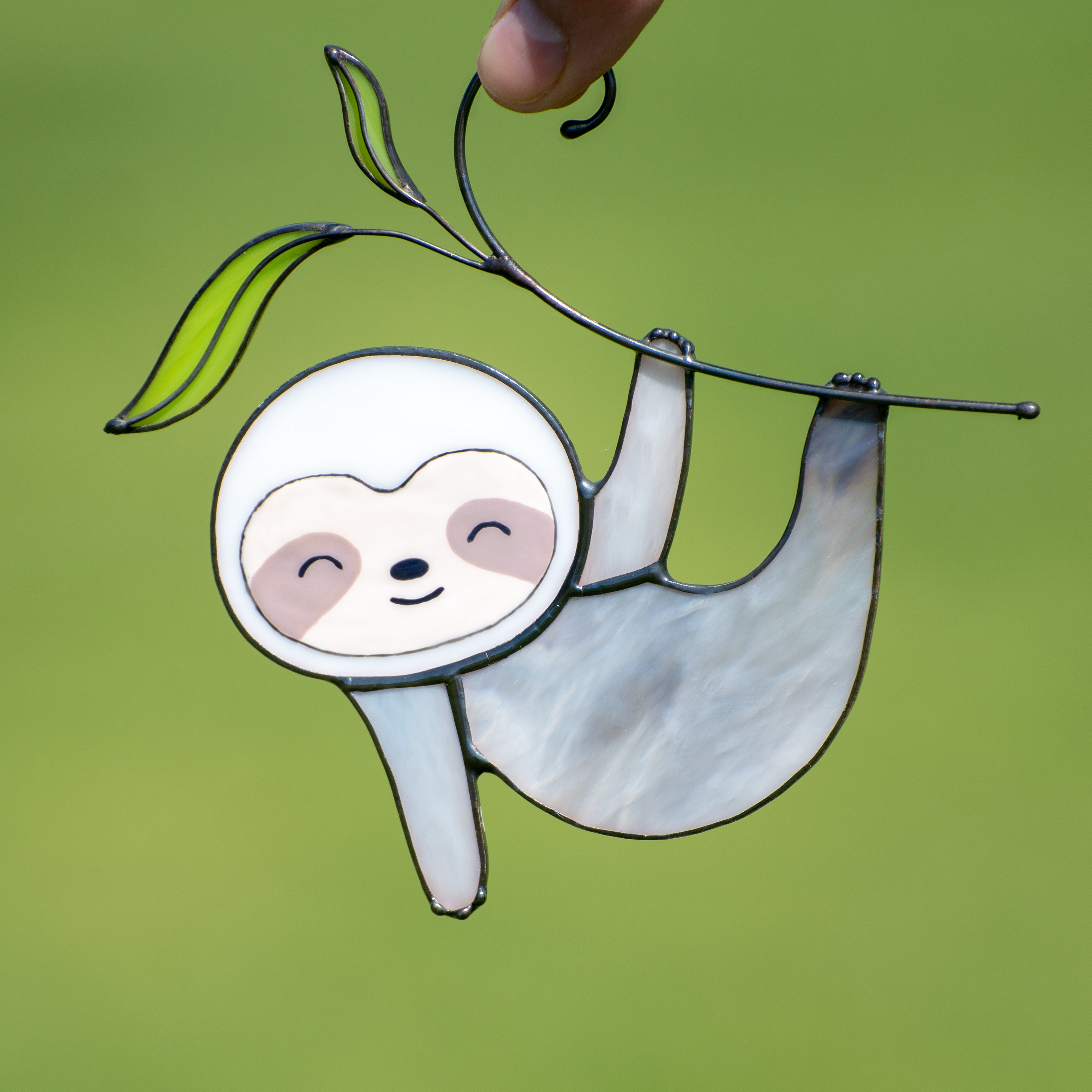 Zoomed stained glass sloth suncatcher