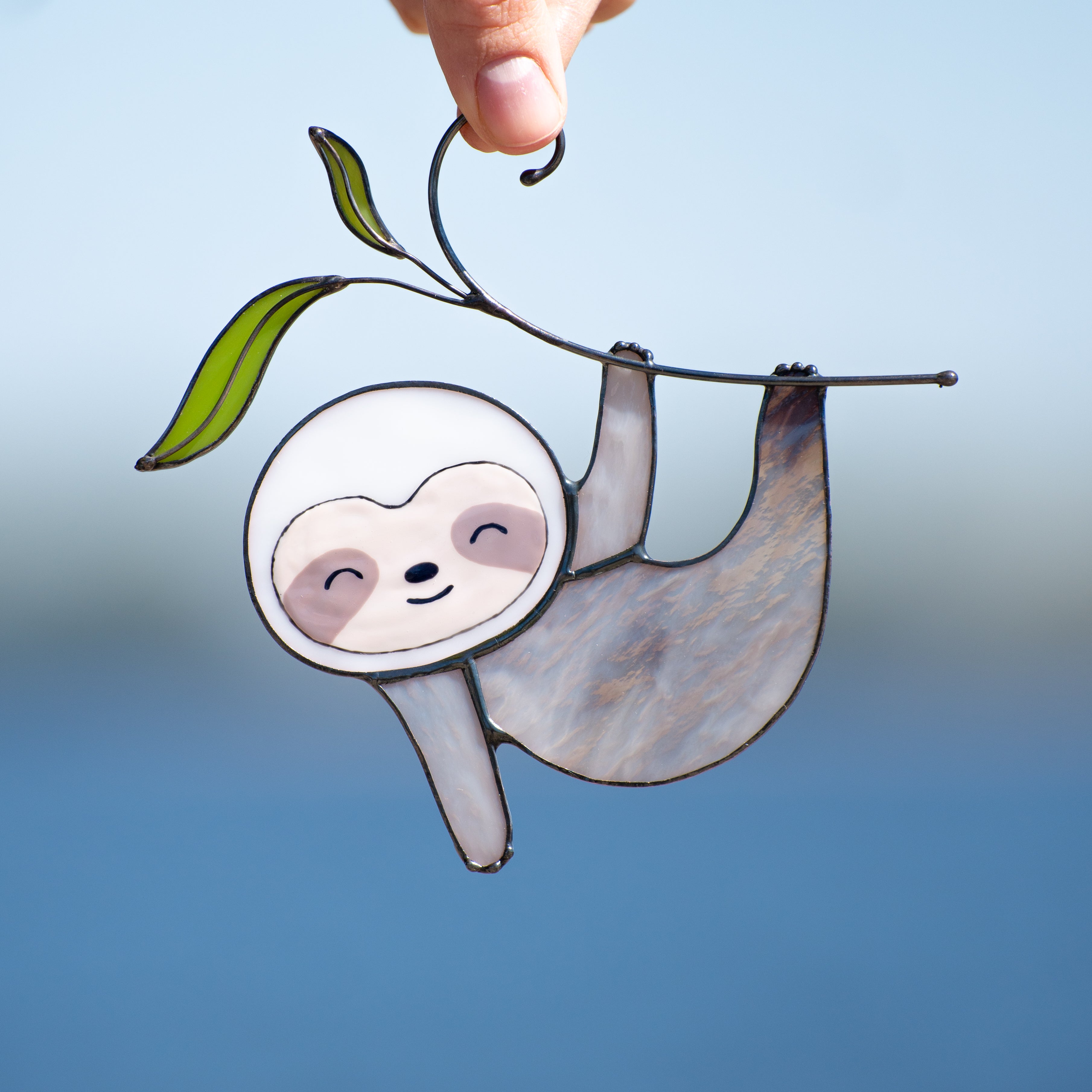 Cute stained glass sloth on the branch window hanging 