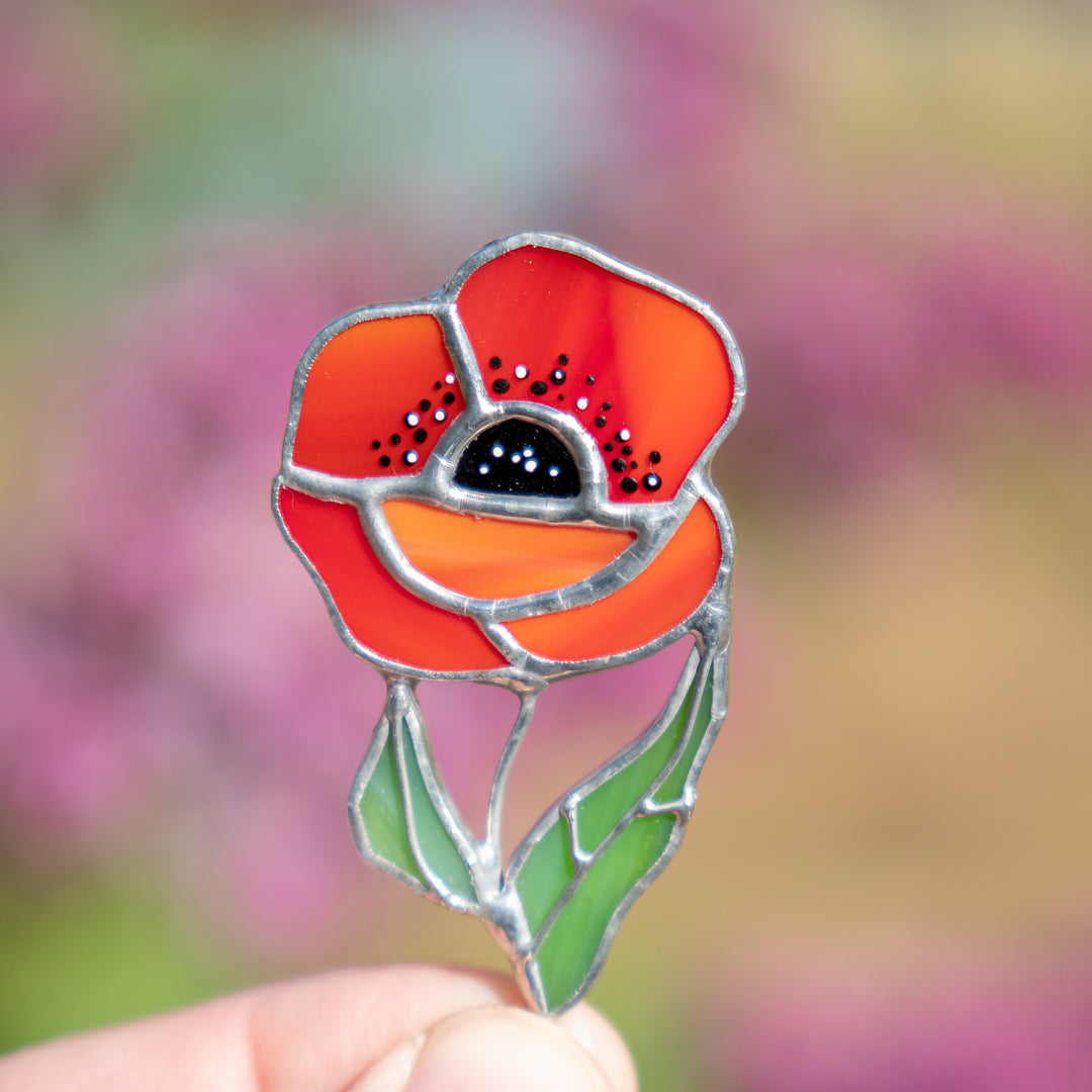 Vintage glass sale bottle embellished with red stained glass poppies (red flowers)