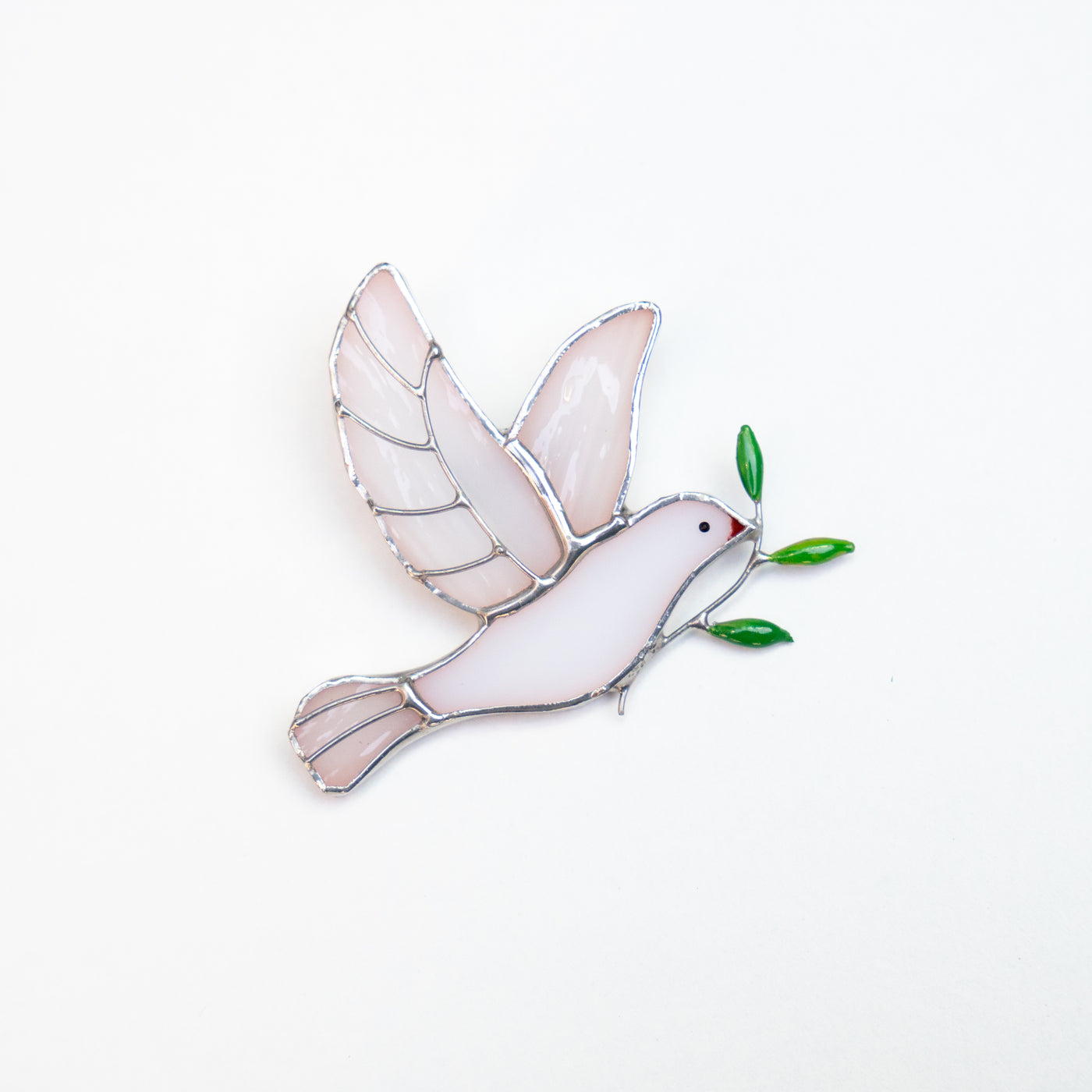 Stained glass pin of a dove of peace