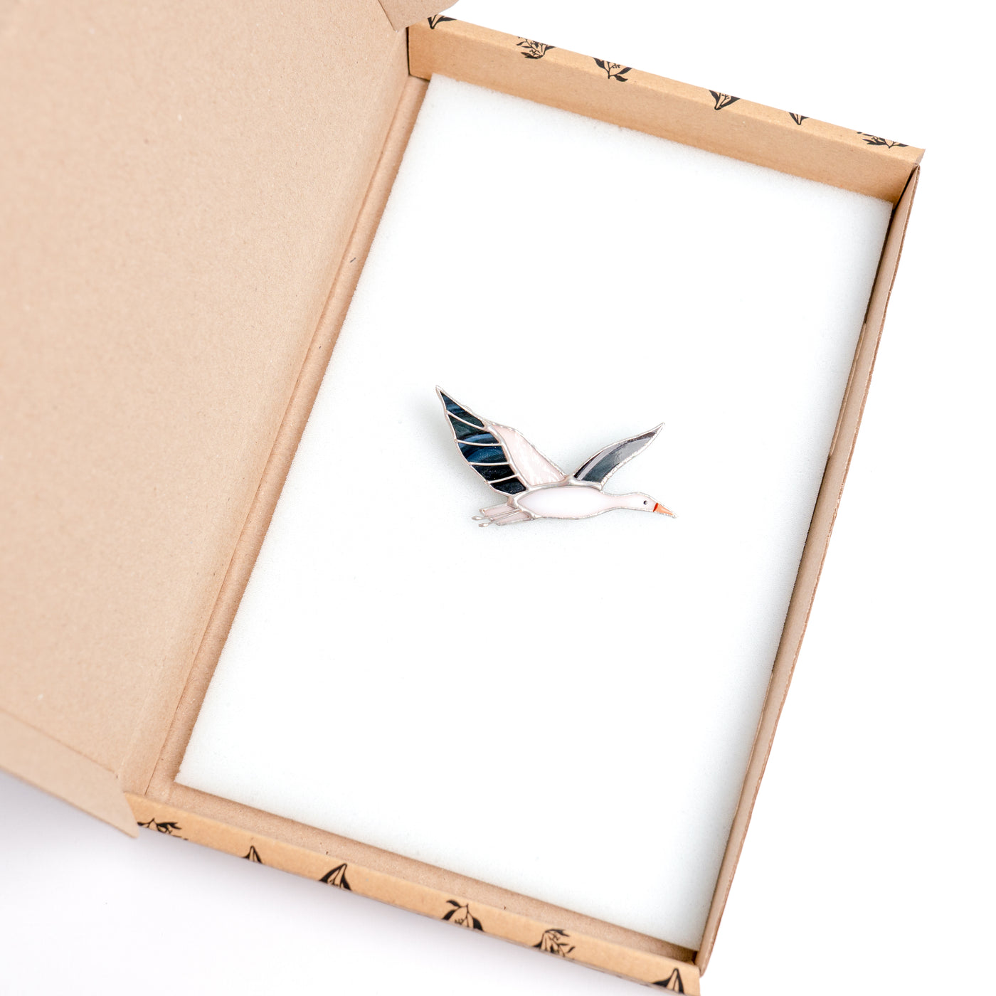 Stained glass stork brooch in a brand box