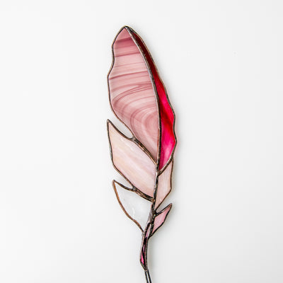 Pink with blotchiness stained glass feather suncatcher