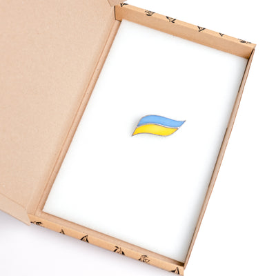 Stained glass Ukrainian flag pin in a brand box