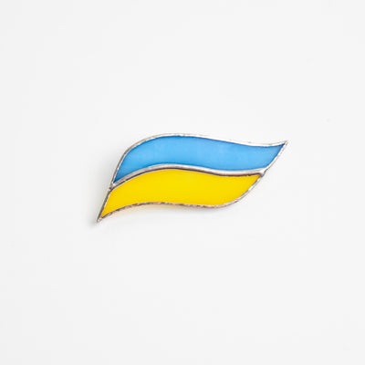 Stained glass brooch in the shape of Ukrainian flag