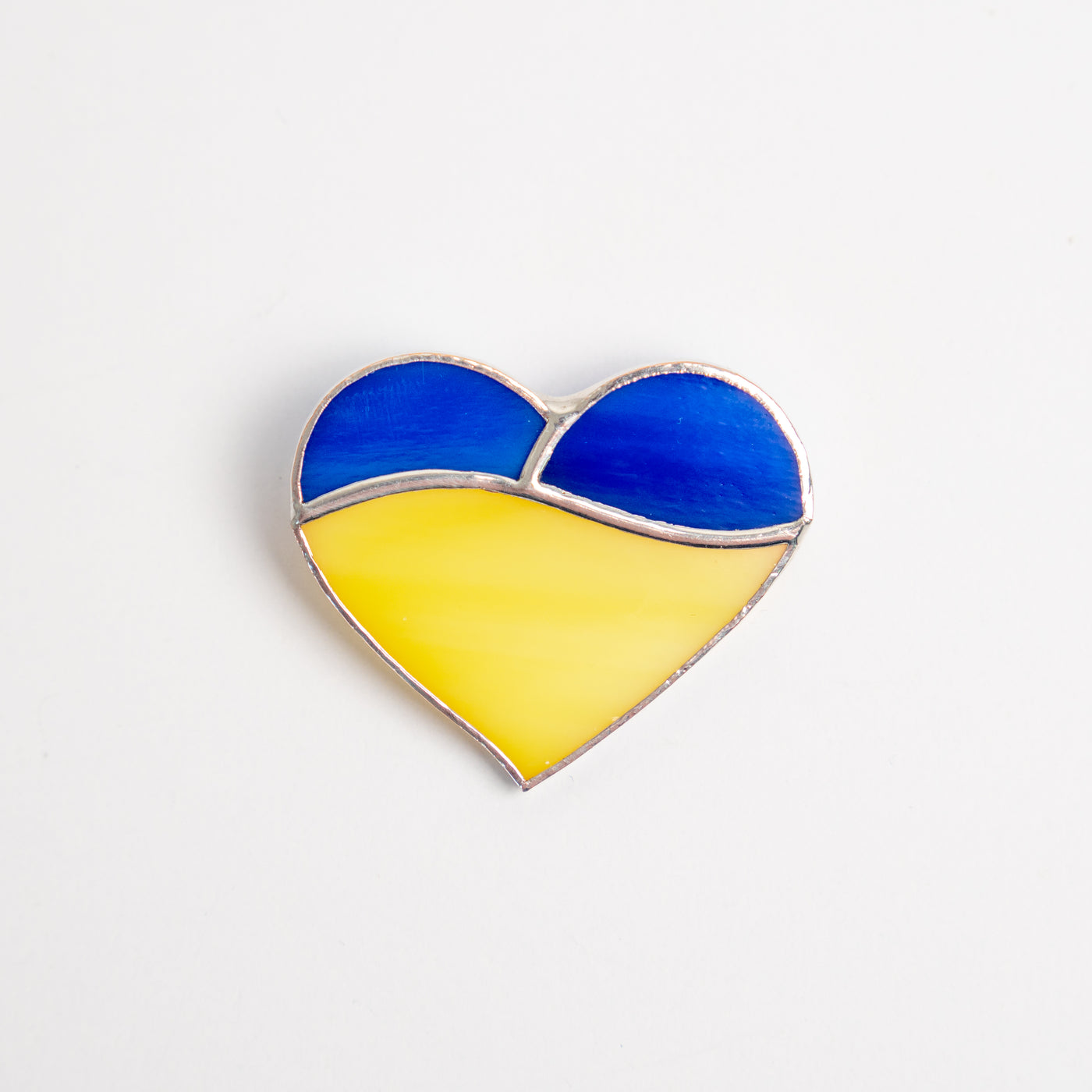 Stained glass dark-blue and yellow heart brooch