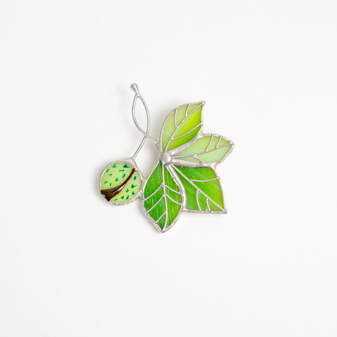 Stained glass chestnut with the leaves brooch