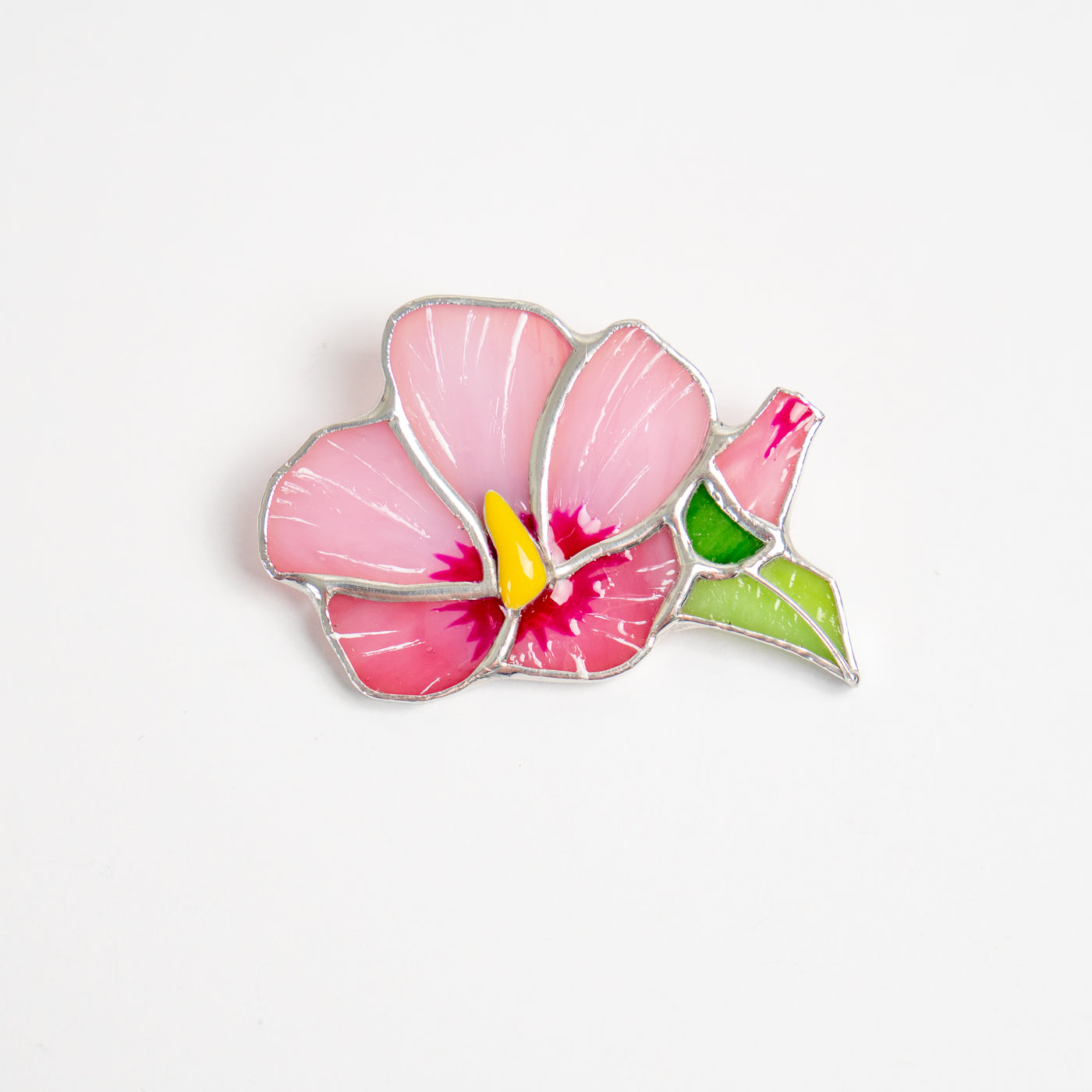 Stained glass pink mallow flower with yellow in the middle brooch