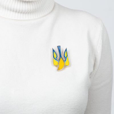 Ukrainian birdie pin on a sweater