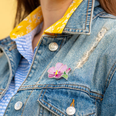 Stained glass pink mallow pin on a jeans jacket 