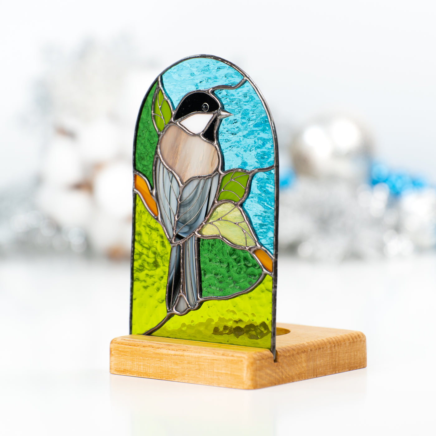 Zoomed stained glass chickadee panel