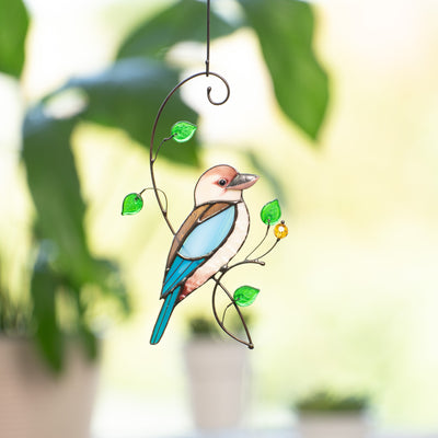 Stained glass kookaburra on the branch with leaves window decor