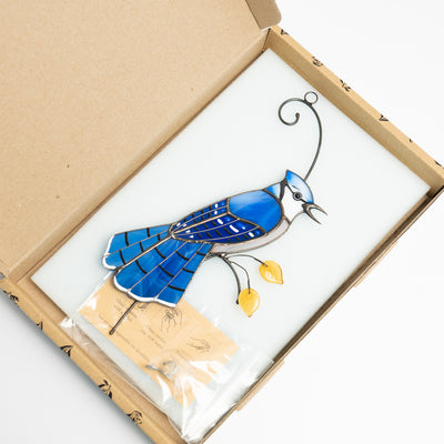 Stained glass blue jay bird in a brand box