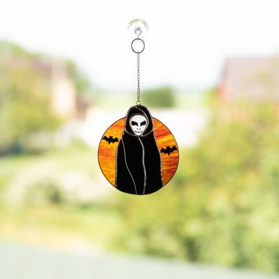Grim Reaper with the orange moon and bats on the background suncatcher of stained glass