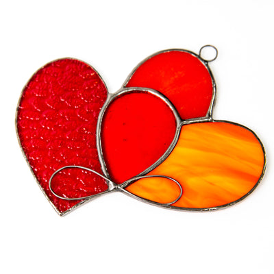 Zoomed stained glass eternity symbol on stained glass hearts suncatcher