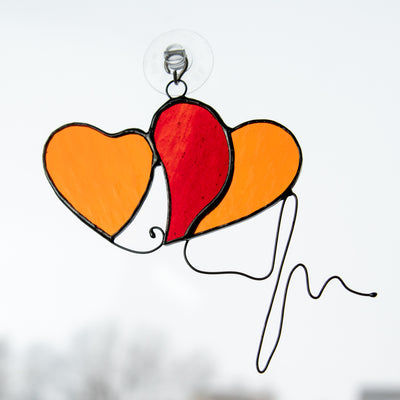 Stained glass two hearts with wired heartbeat window hanging 