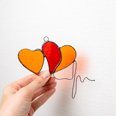Stained glass orange hearts with heartbeat suncatcher for Valentines day