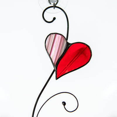 Zoomed stained glass upper heart with the pink part 