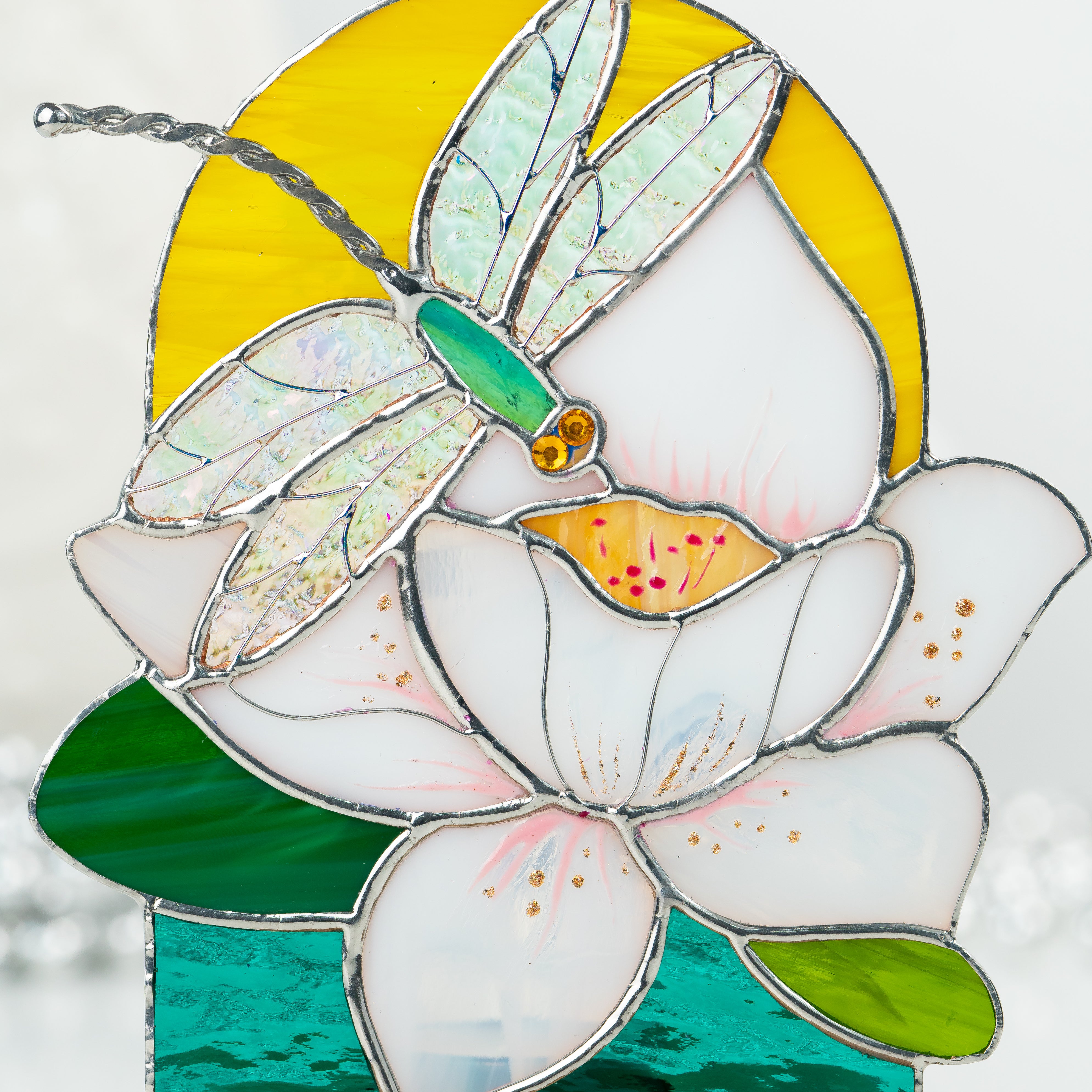 Zoomed stained glass panel depicting dragonfly
