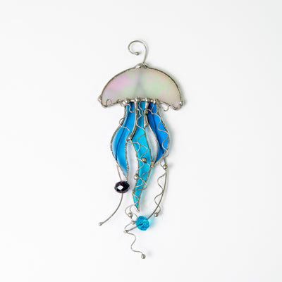 White stained glass jellyfish with blue tentacles suncatcher
