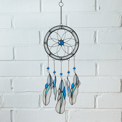 Light-blue stained glass dreamcatcher with blue feathers for home decor