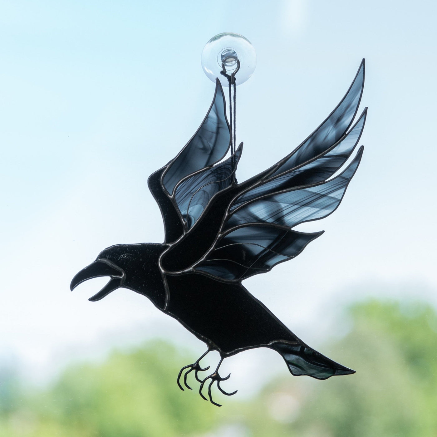 Stained glass flying raven with blotchiness on wings suncatcher for window decoration 