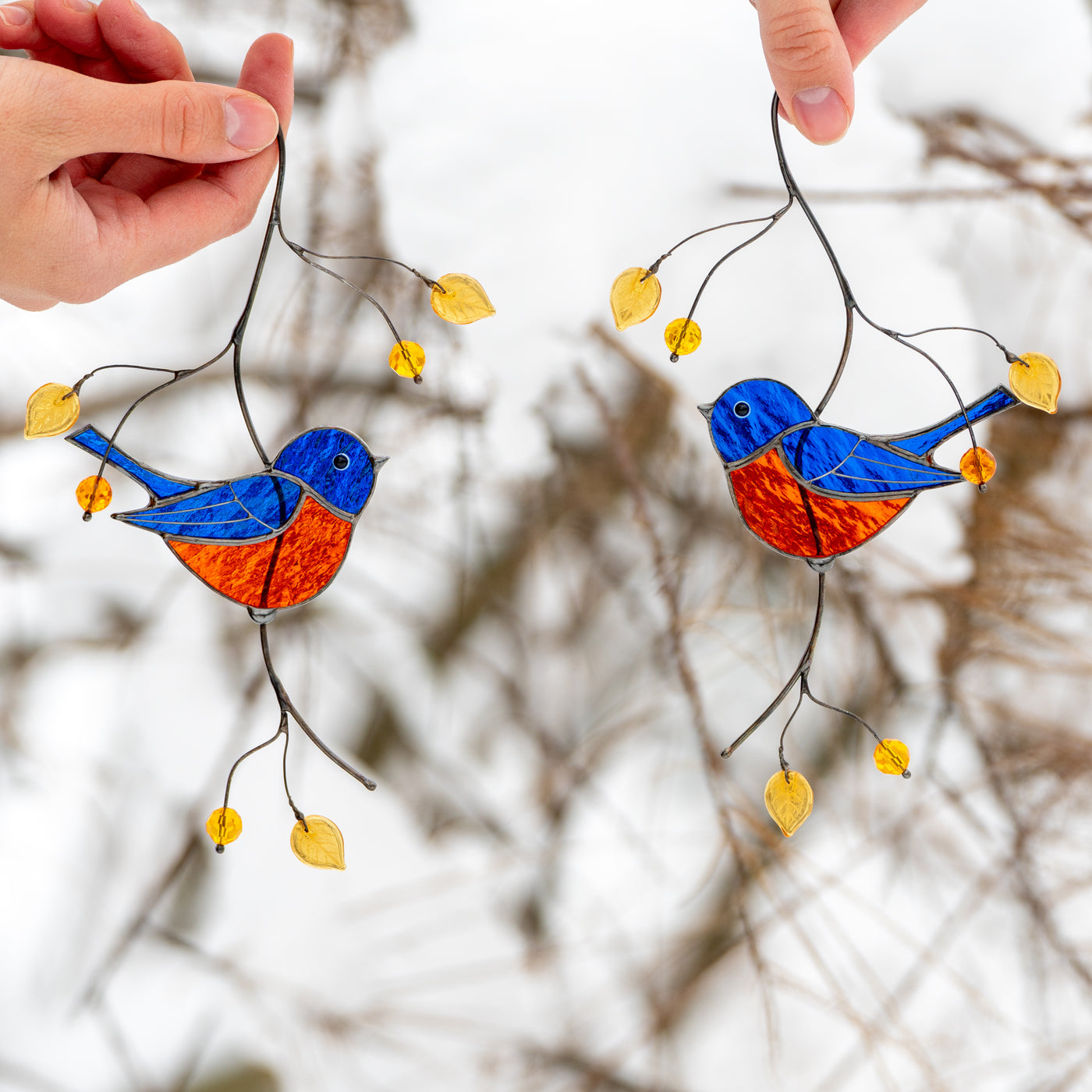 Pair of blue chickadees of stained glass suncatcher
