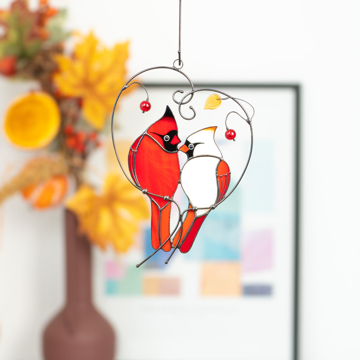 Stained glass couple of cardinals on the heart-shaped branch window hanging