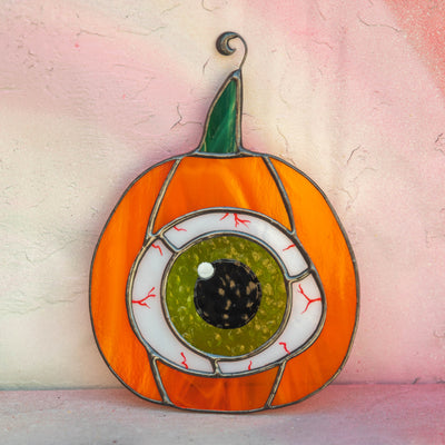 Halloween stained glass pumpkin with the green eye window decor