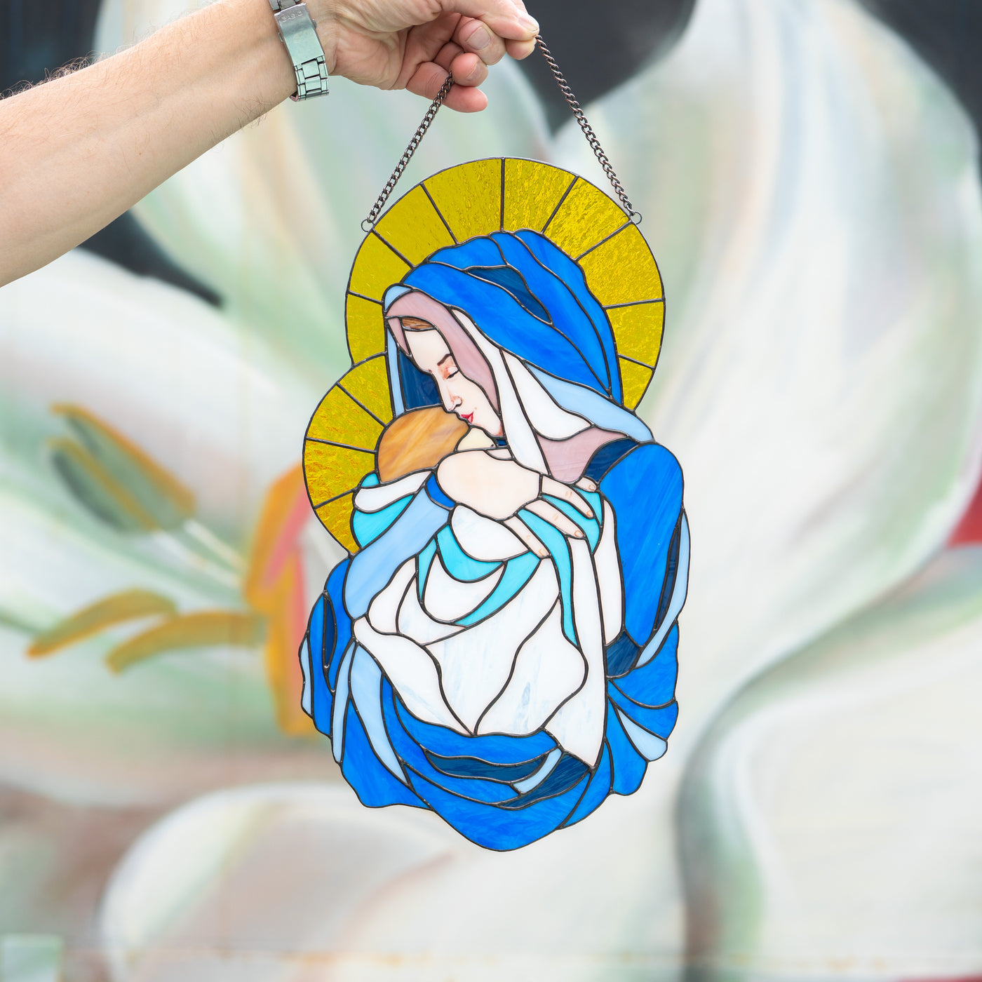 Stained glass religious window panel depicting Virgin Mary with Jesus Christ 