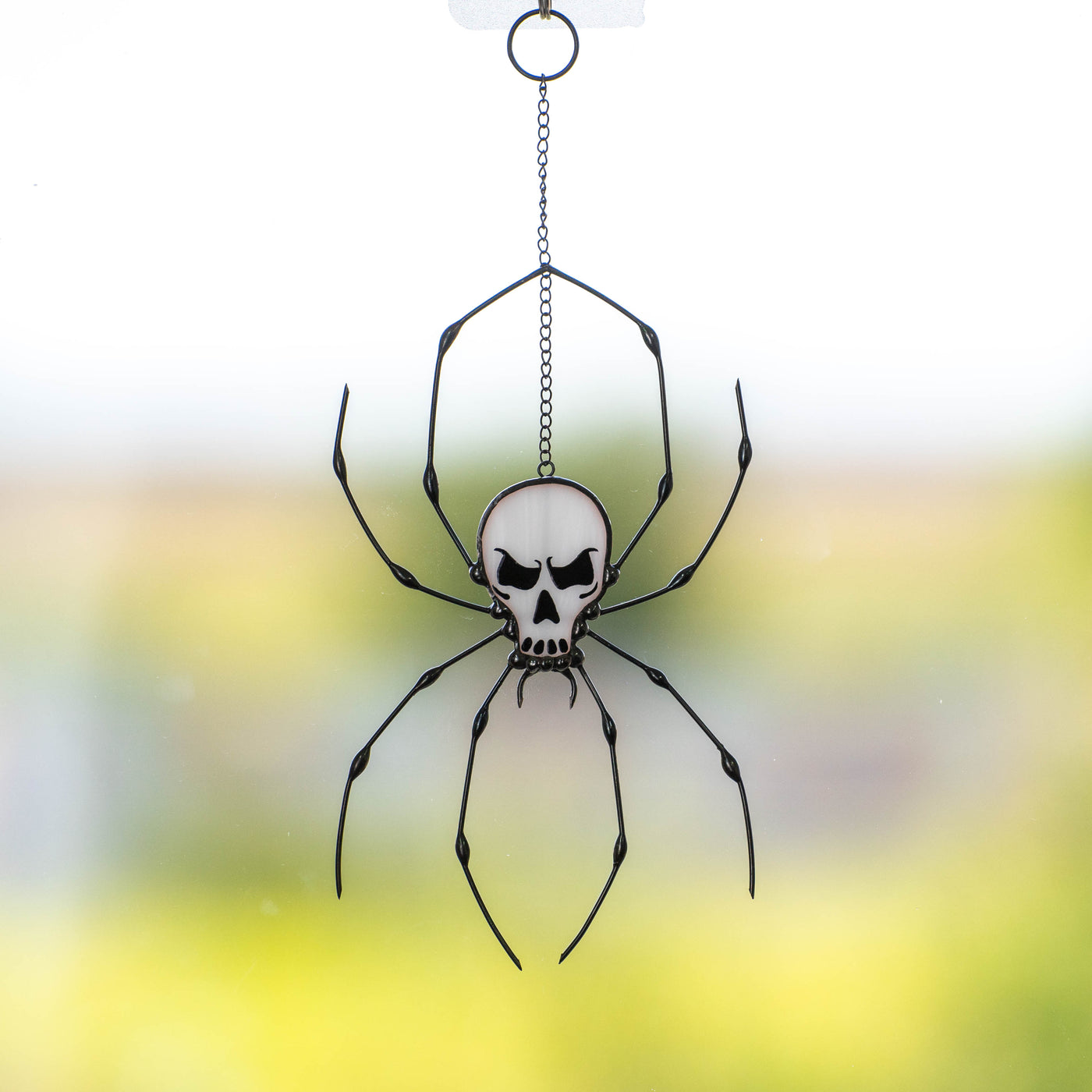 Stained glass spider skeleton suncatcher for Halloween 