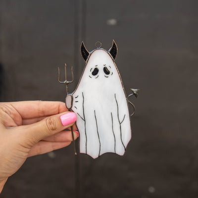Stained glass ghost with pitchfork window hanging