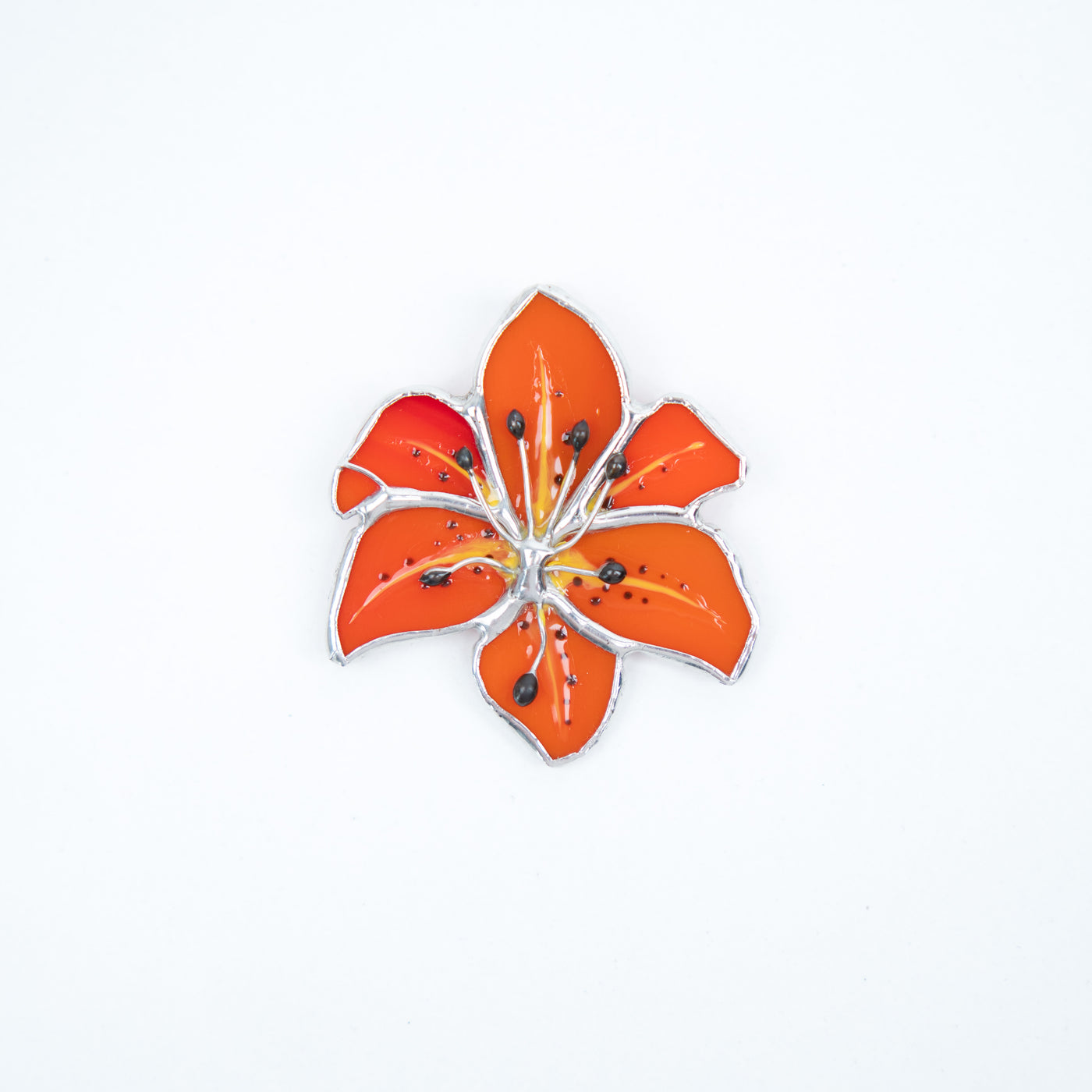 Lily pin of stained glass