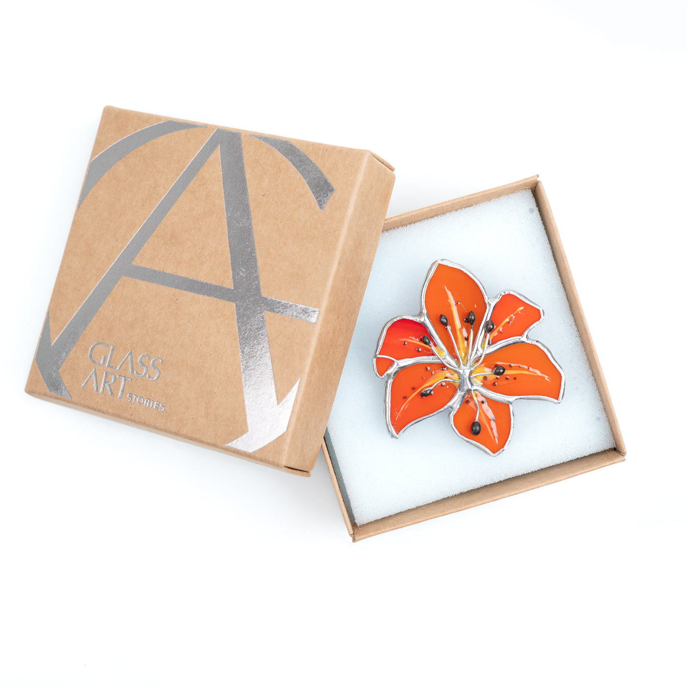 Lily brooch in a brand box