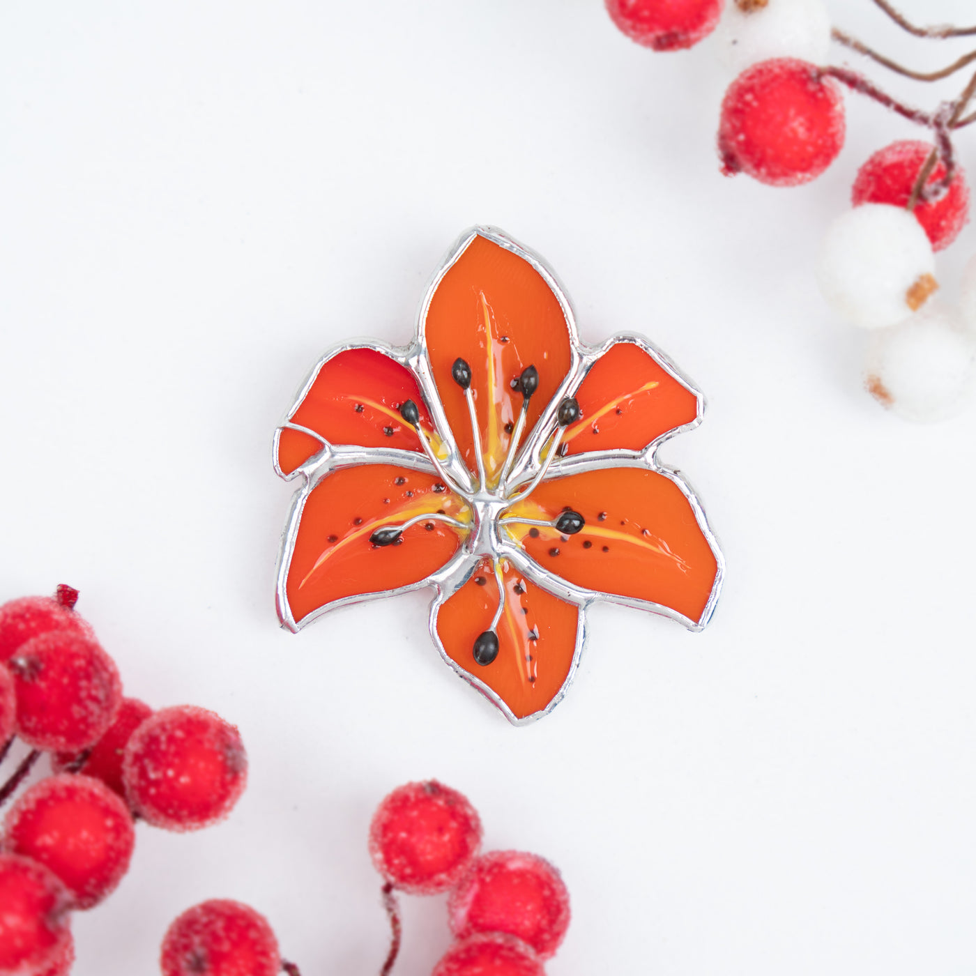 Zoomed lily flower brooch of stained glass