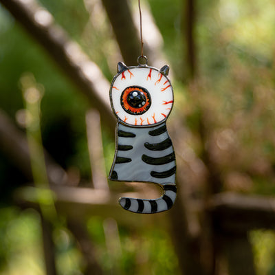 Eye-headed stained glass grey cat window hanging for Halloween