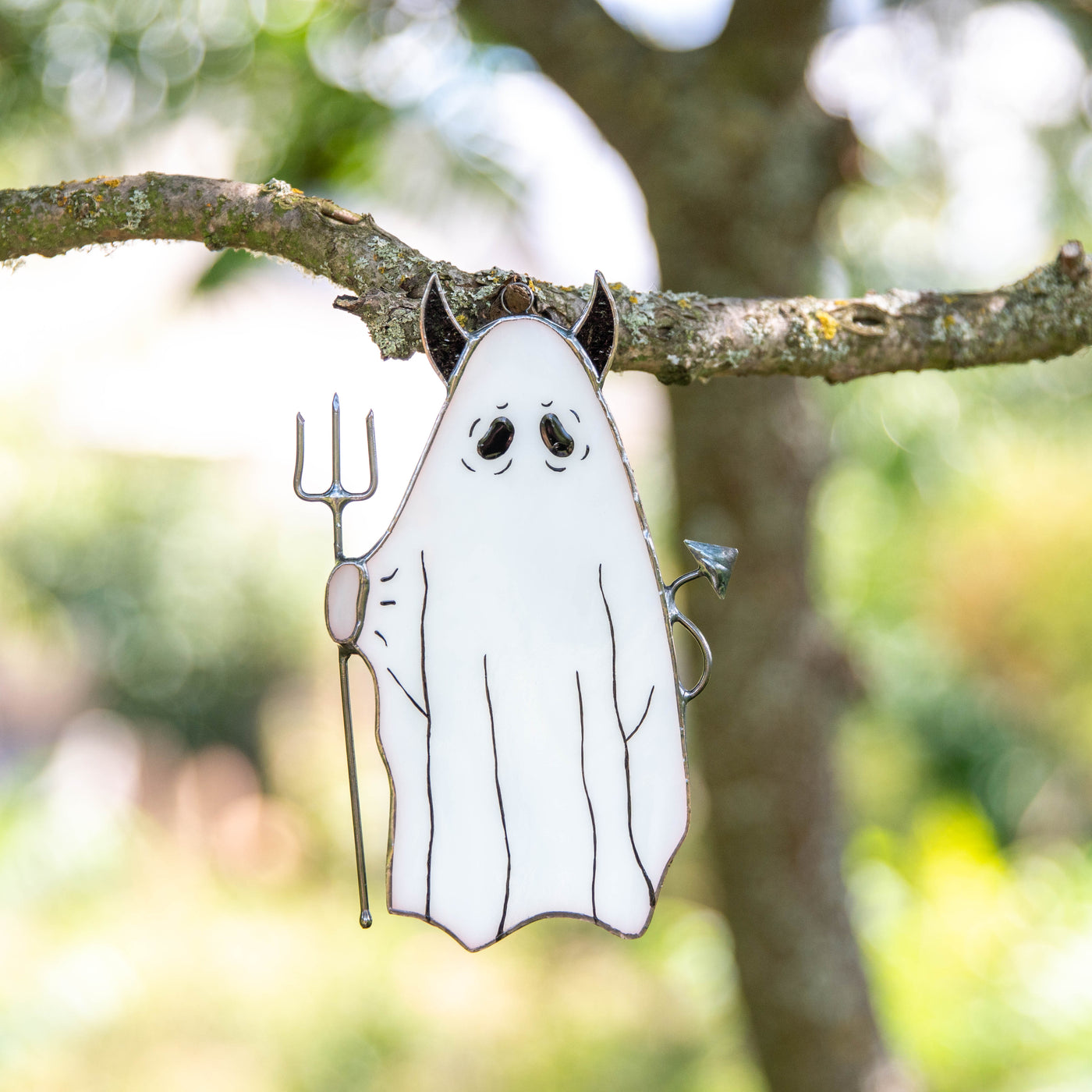 Ghost with pitchfork suncatcher of stained glass for Halloween window decor