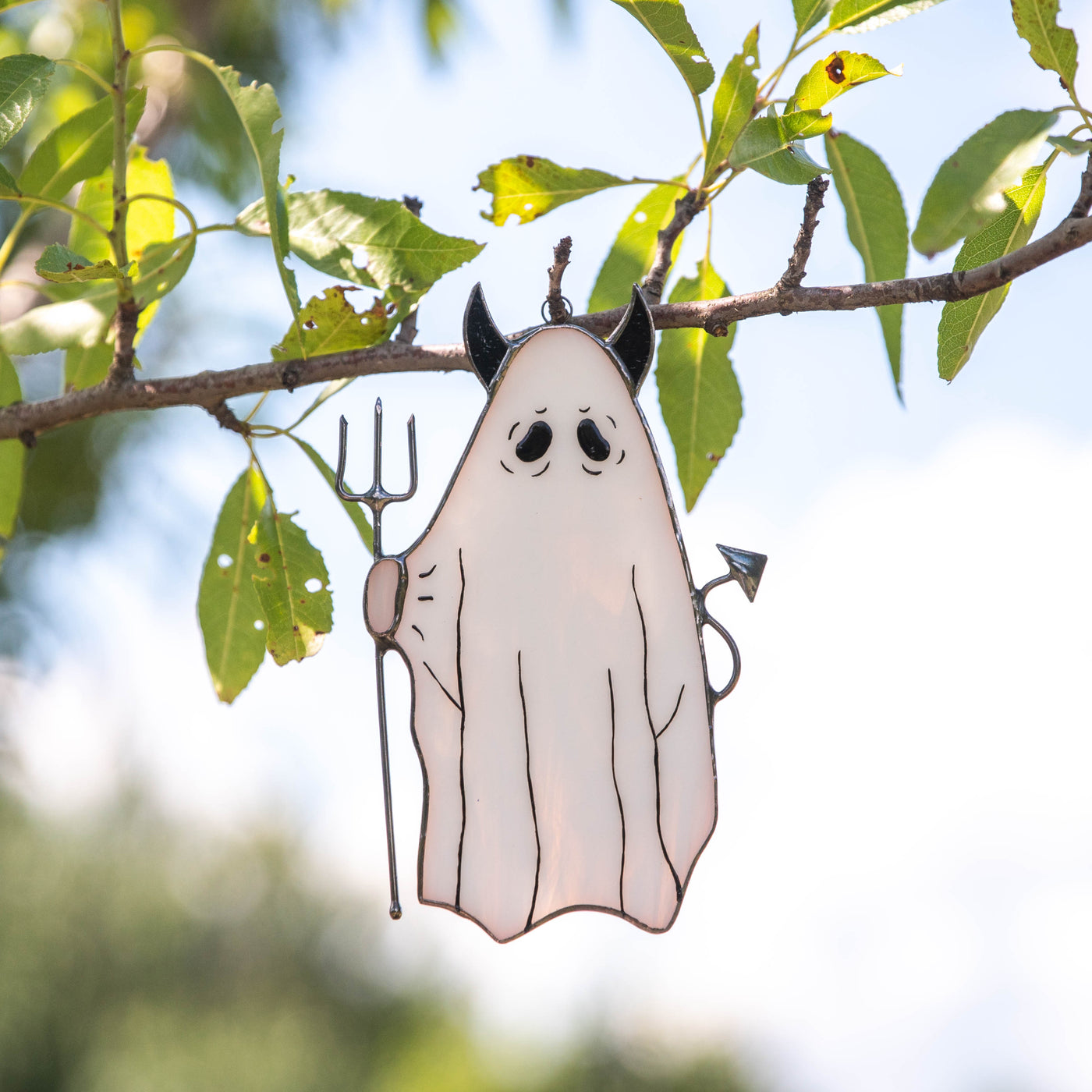 Stained glass suncatcher of ghost with pitchfork