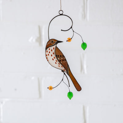 Brown thrasher suncatcher of stained glass