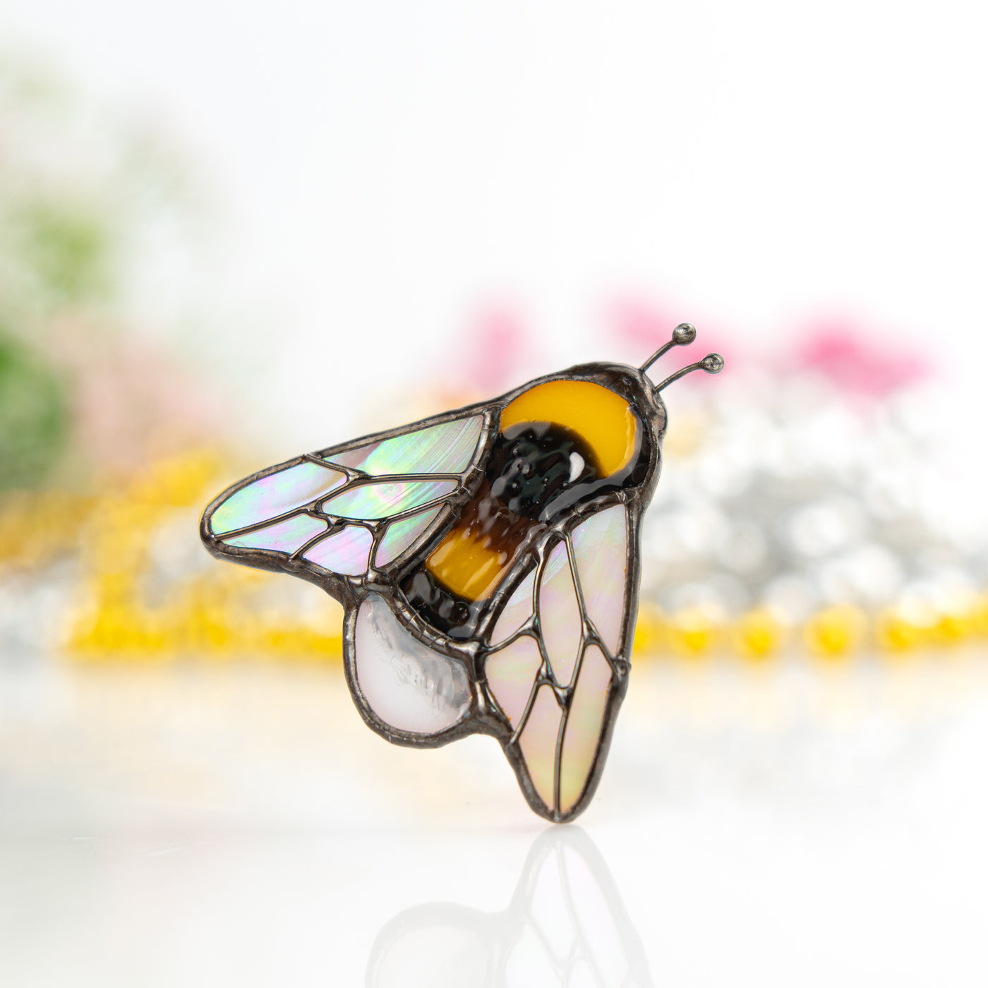 Stained glass bumble bee with iridescent wings brooch