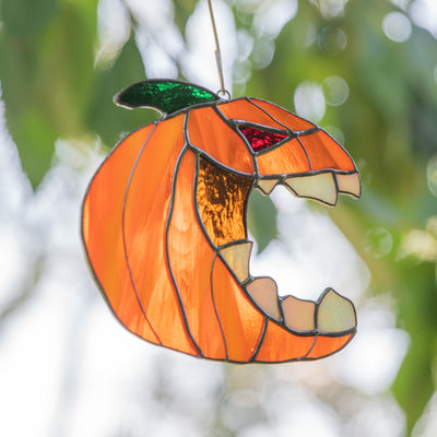 Spooky stained glass pumpkin with the fangs suncatcher