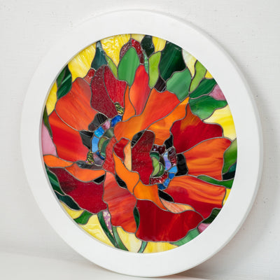 Round window panel depicting red poppies of stained glass