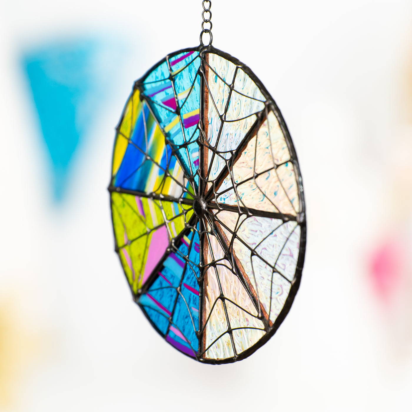 Side-view of the Wednesday's stained glass suncatcher