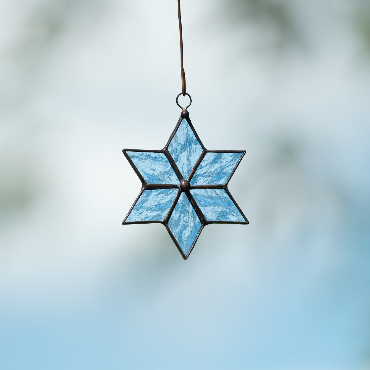 Stained glass snowflake suncatcher for winter holidays decor