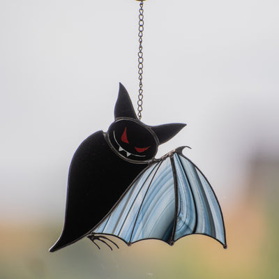 Black stained glass bat with red eyes suncatcher
