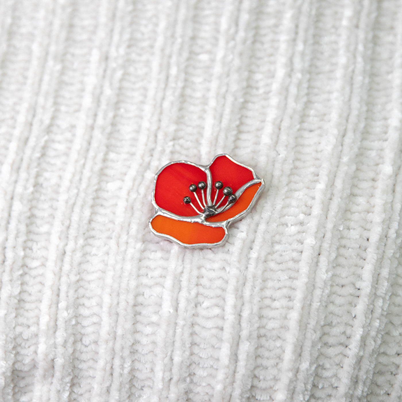 Zoomed stained glass poppy pin