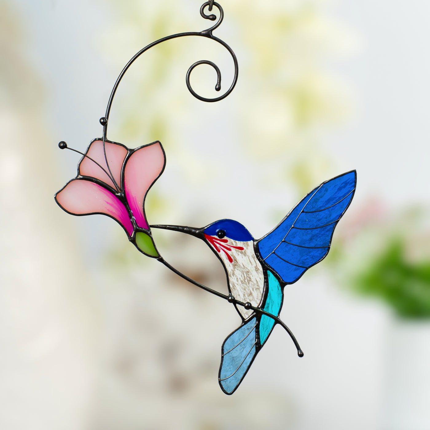 Stained glass blue hummingbird window hanging