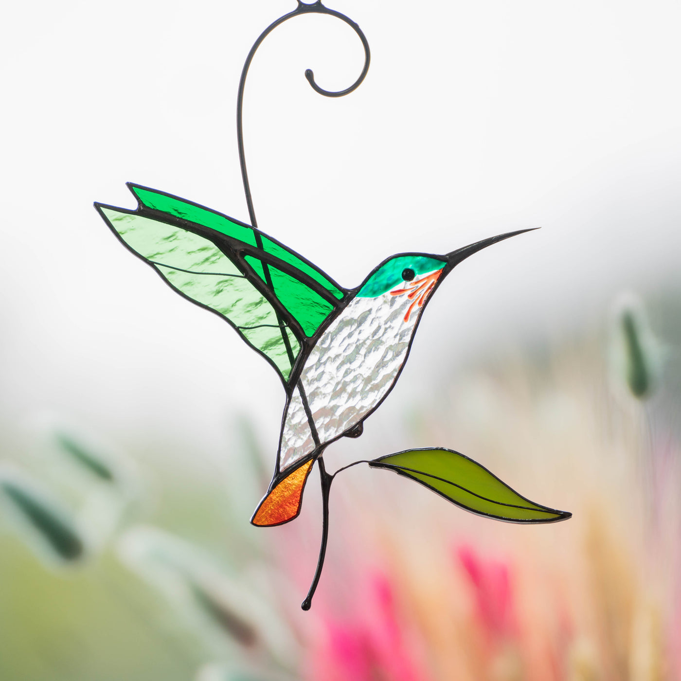 Stained glass flying green hummingbird suncatcher